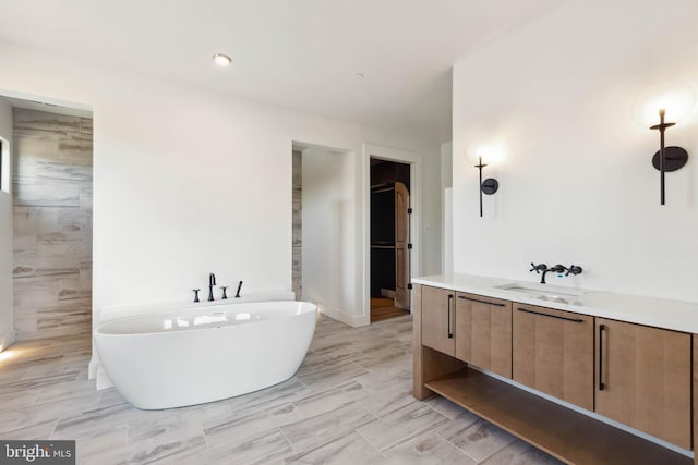 bathroom featuring a bathtub and vanity