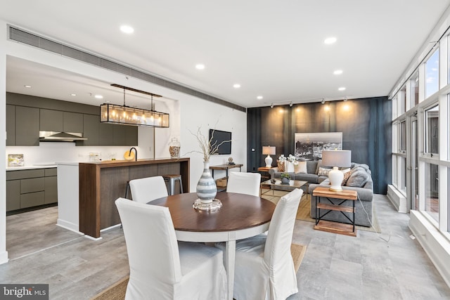 dining space with sink