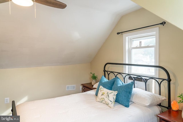 bedroom with ceiling fan and lofted ceiling