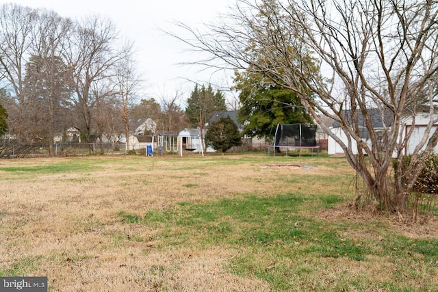 view of yard featuring a trampoline