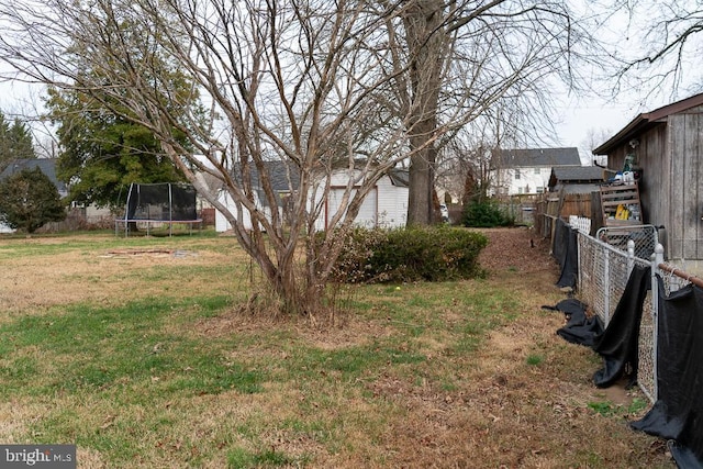 view of yard featuring a trampoline