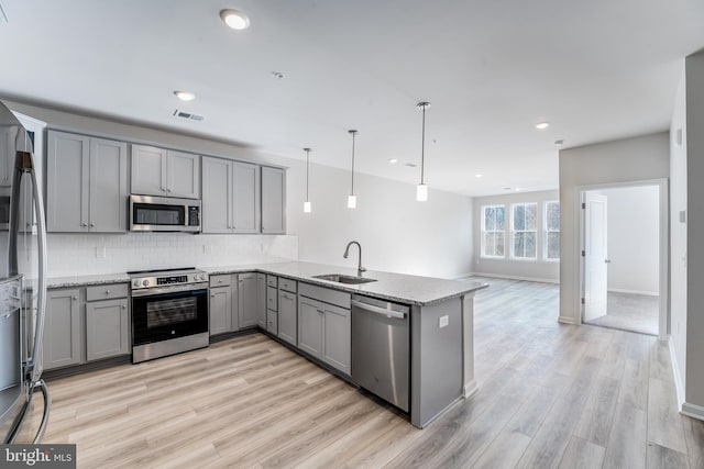 living area with light hardwood / wood-style floors