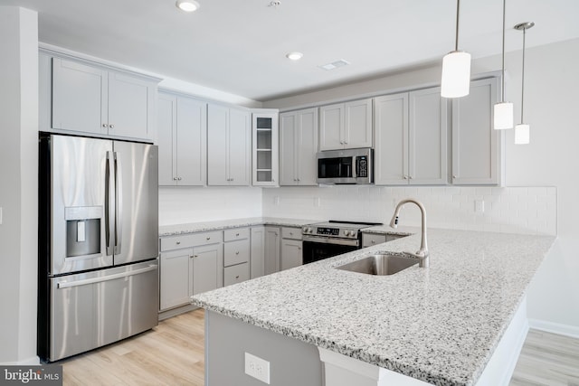 office featuring washer / clothes dryer and light hardwood / wood-style flooring