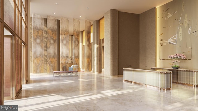 390 Ocean Ave Unit 1403, Long Branch, NJ 07740 - community lobby featuring a towering ceiling and recessed lighting