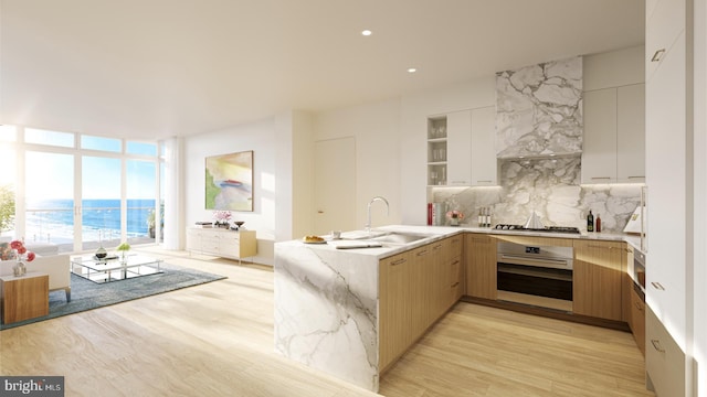 390 Ocean Ave Unit 1403, Long Branch, NJ 07740 - kitchen with stainless steel appliances, a peninsula, modern cabinets, backsplash, and expansive windows