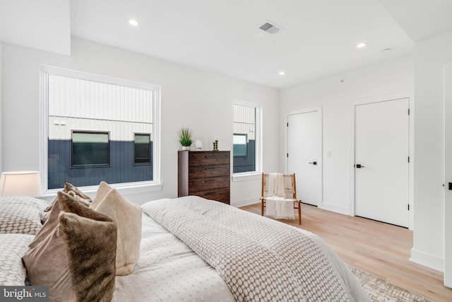 bedroom featuring light hardwood / wood-style flooring