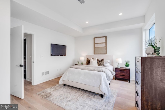 bedroom with light hardwood / wood-style floors