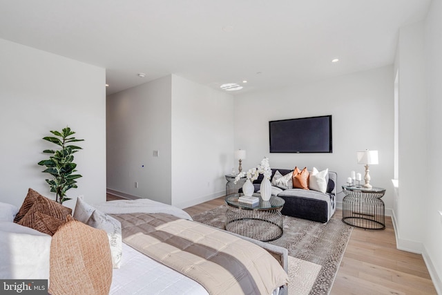 bedroom with light hardwood / wood-style flooring