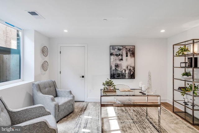 home office with hardwood / wood-style floors