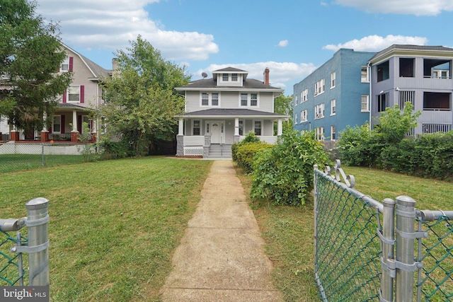 view of front facade with a porch and a front lawn