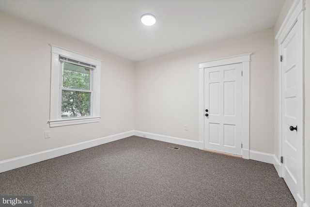 spare room with carpet floors