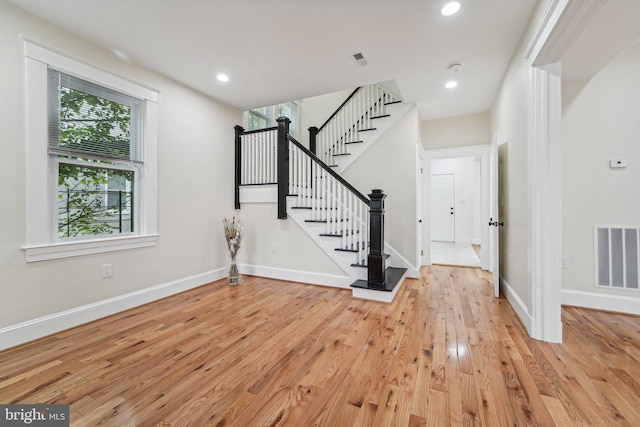 foyer with light wood-type flooring