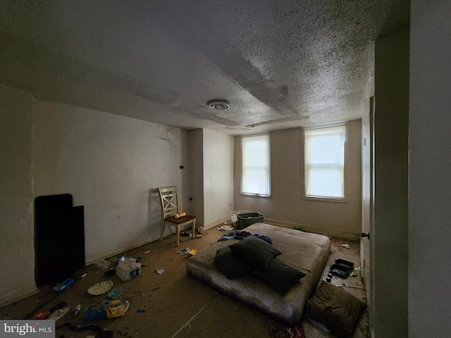 miscellaneous room featuring a textured ceiling