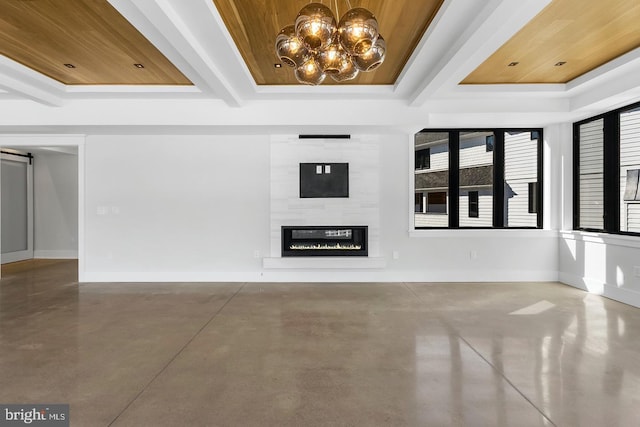 unfurnished living room featuring wood ceiling, a raised ceiling, a fireplace, and concrete floors