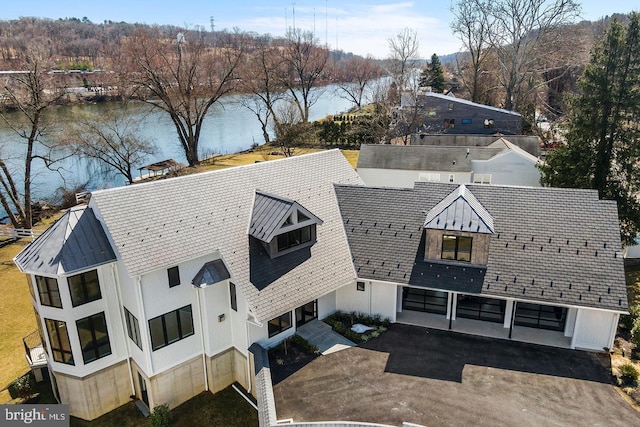 bird's eye view with a water view