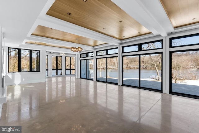 interior space featuring an inviting chandelier, wooden ceiling, and concrete flooring