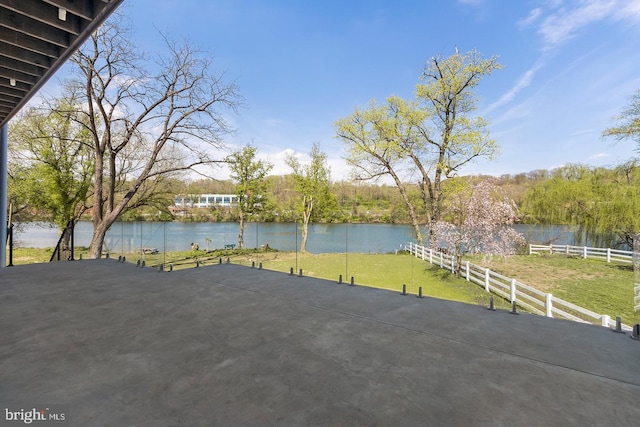 view of patio featuring a water view