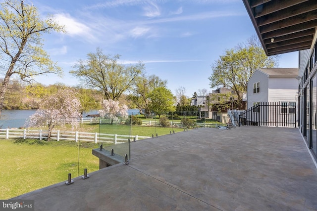 view of patio / terrace featuring a water view