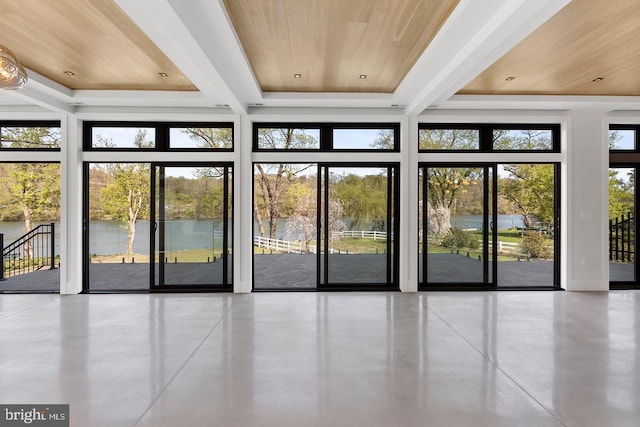 entryway with a water view and wooden ceiling