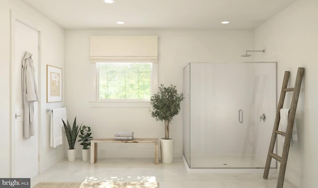 bathroom with tile patterned floors and walk in shower