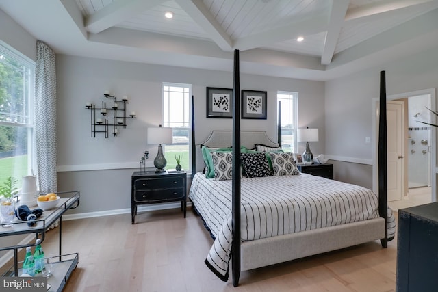 bedroom featuring light hardwood / wood-style floors, wood ceiling, beam ceiling, and multiple windows