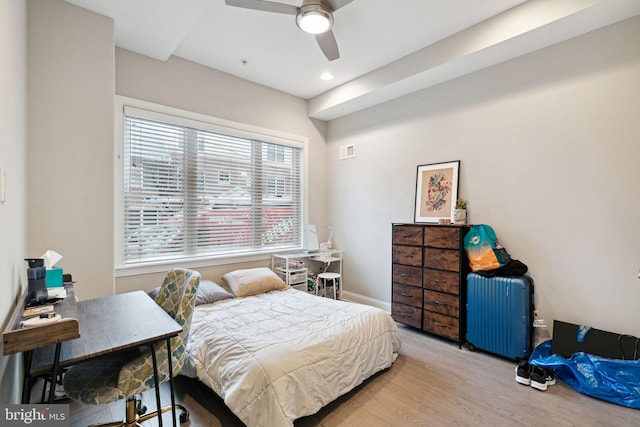 bedroom featuring light hardwood / wood-style flooring and ceiling fan