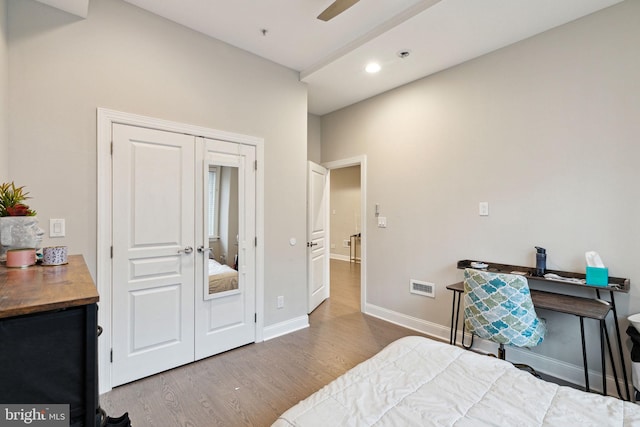 bedroom featuring wood-type flooring