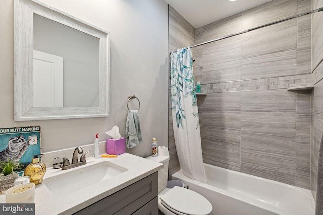 full bathroom featuring shower / bath combo, vanity, and toilet