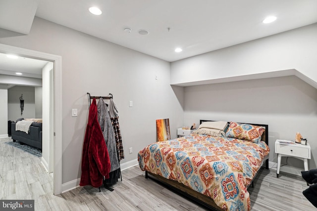 bedroom featuring light wood-type flooring