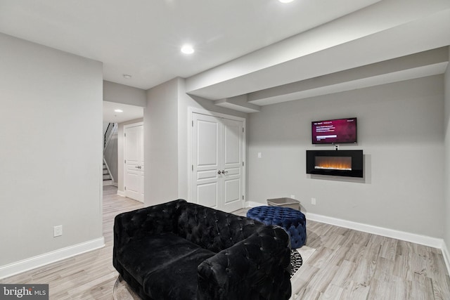 sitting room with light wood-type flooring