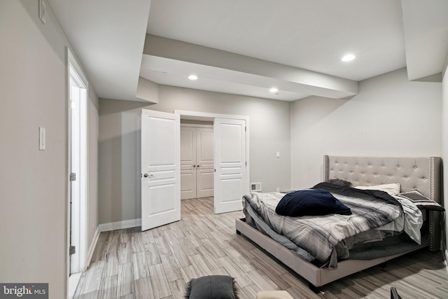 bedroom featuring light hardwood / wood-style floors