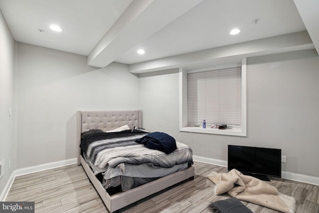 bedroom with light hardwood / wood-style floors