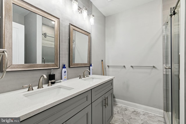 bathroom with vanity and an enclosed shower