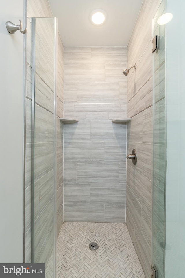 bathroom with an enclosed shower