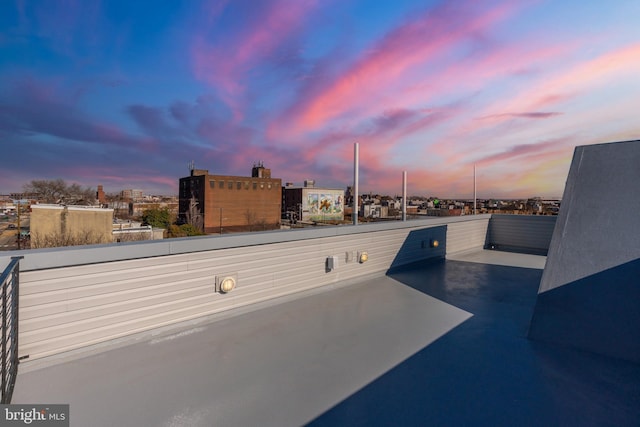 view of patio terrace at dusk