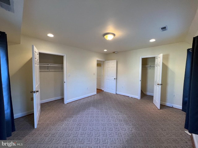 unfurnished bedroom with carpet floors