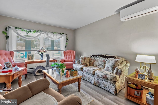 living room featuring light hardwood / wood-style floors, baseboard heating, and a wall mounted AC