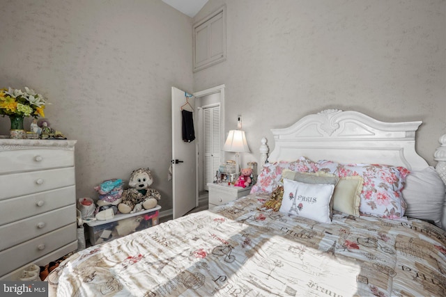 bedroom with vaulted ceiling