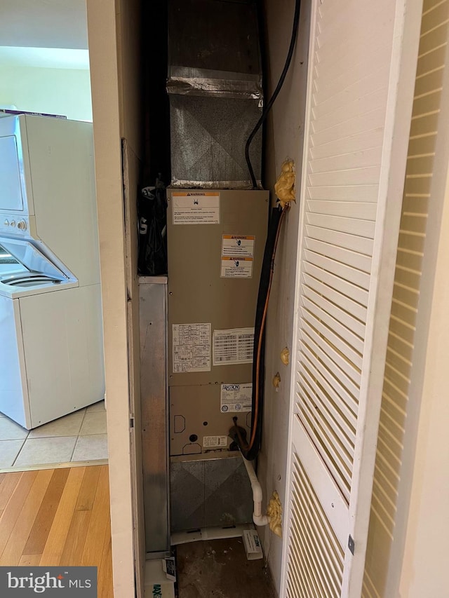 1819 D St NE Unit 1, 2, 3 & 4, Washington, DC 20002 - utility room with washer / dryer and heating unit