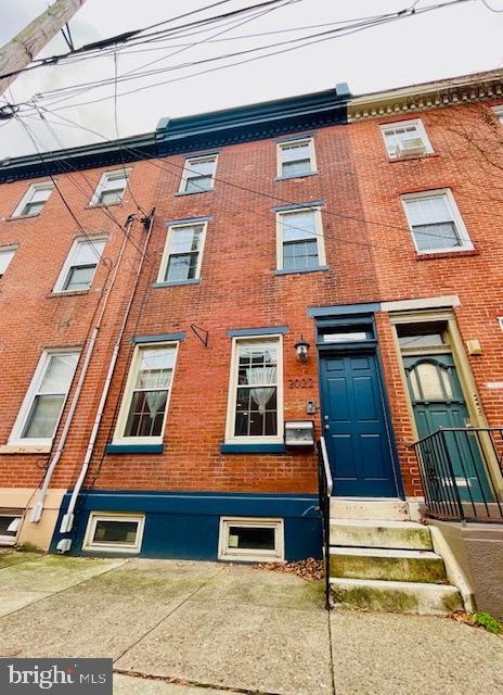 2022 Fitzwater St, Philadelphia, PA 19146 - view of front of home with brick siding and entry steps