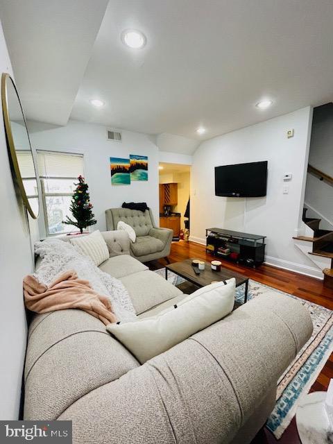 2022 Fitzwater St, Philadelphia, PA 19146 - living area featuring stairs, wood finished floors, and recessed lighting