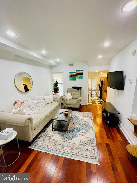 2022 Fitzwater St, Philadelphia, PA 19146 - living room featuring wood-type flooring and baseboards