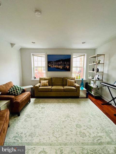 2022 Fitzwater St, Philadelphia, PA 19146 - living area featuring plenty of natural light and wood finished floors