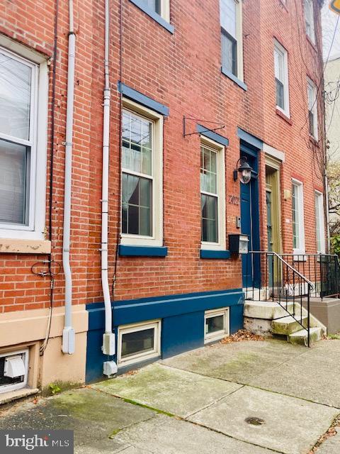 2022 Fitzwater St, Philadelphia, PA 19146 - doorway to property featuring brick siding