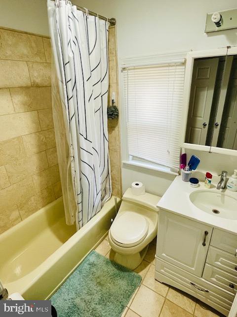 2022 Fitzwater St, Philadelphia, PA 19146 - bathroom with shower / tub combo with curtain, vanity, and tile patterned flooring