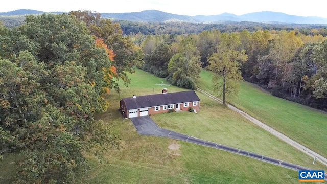 drone / aerial view featuring a mountain view