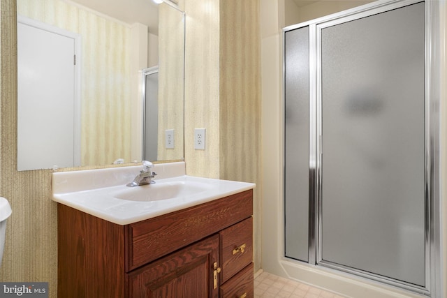 bathroom with vanity and an enclosed shower