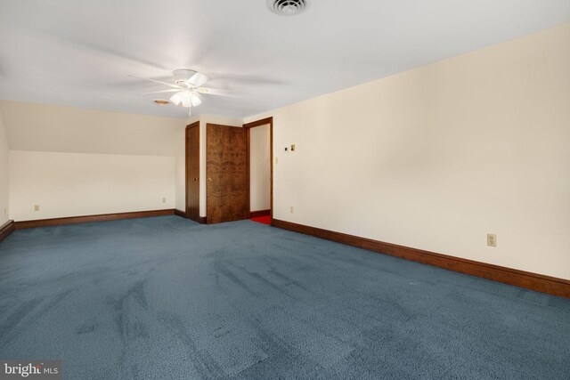 carpeted empty room with ceiling fan