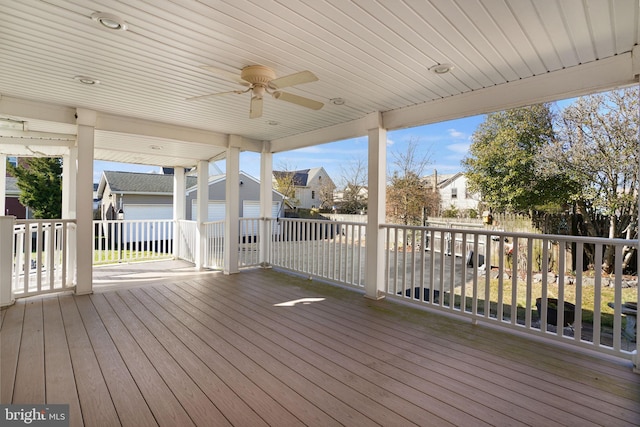 wooden deck with ceiling fan