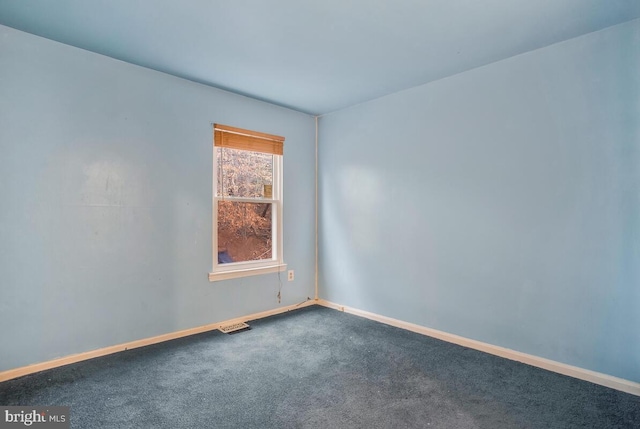 empty room featuring carpet flooring